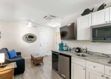 Siesta-Key-Beachside-Villas-One-Bedroom-Suite-Kitchen-and-Sitting-Area
